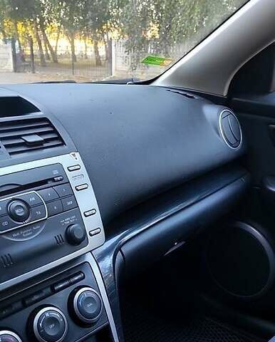 Серый Мазда 6, объемом двигателя 2 л и пробегом 246 тыс. км за 6700 $, фото 1 на Automoto.ua