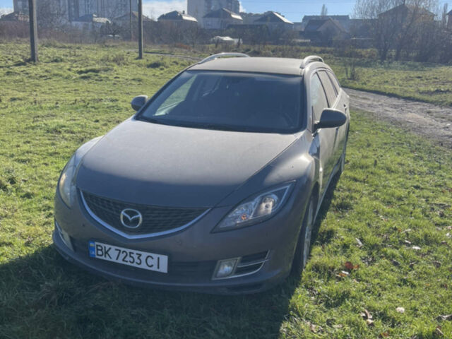 Сірий Мазда 6, об'ємом двигуна 2 л та пробігом 317 тис. км за 6800 $, фото 1 на Automoto.ua