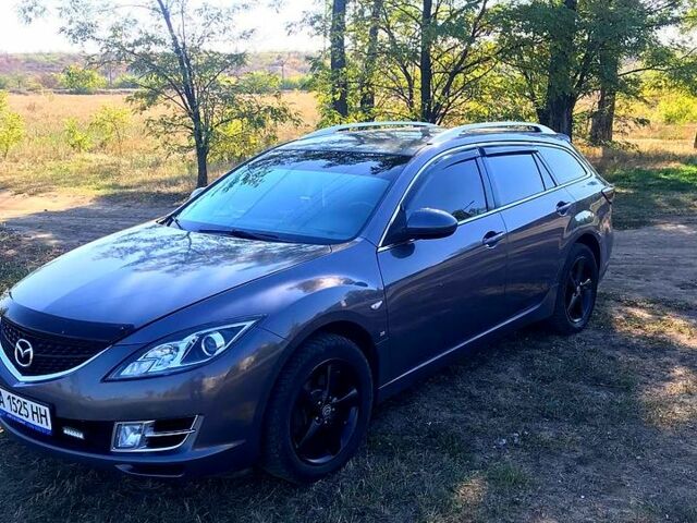 Серый Мазда 6, объемом двигателя 2 л и пробегом 304 тыс. км за 6200 $, фото 1 на Automoto.ua