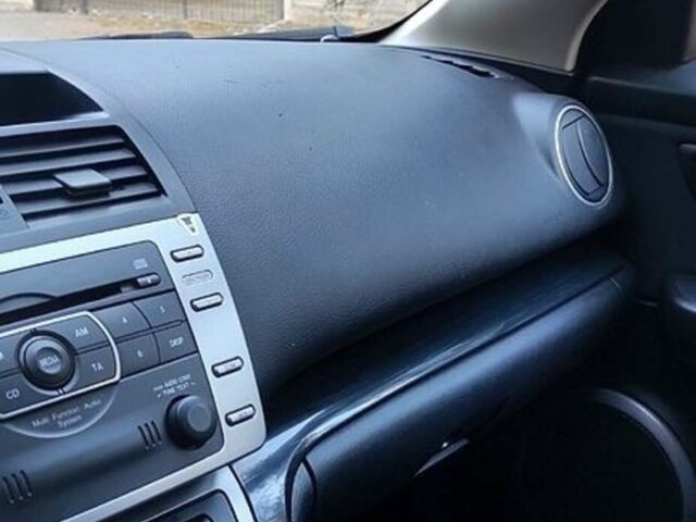 Серый Мазда 6, объемом двигателя 2 л и пробегом 246 тыс. км за 6700 $, фото 1 на Automoto.ua