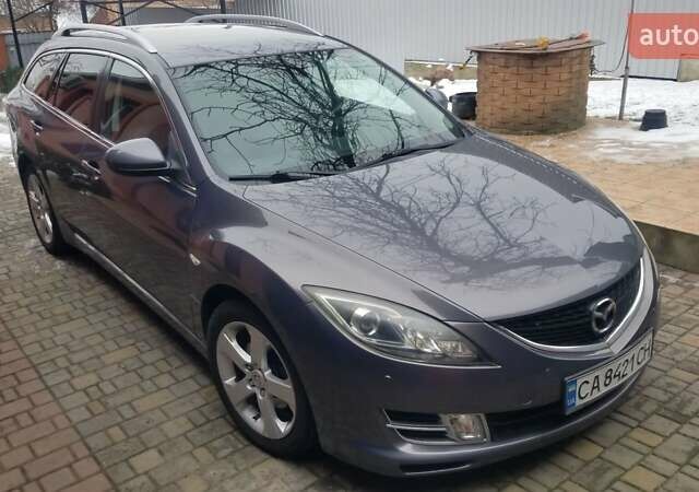 Серый Мазда 6, объемом двигателя 2 л и пробегом 299 тыс. км за 7600 $, фото 1 на Automoto.ua
