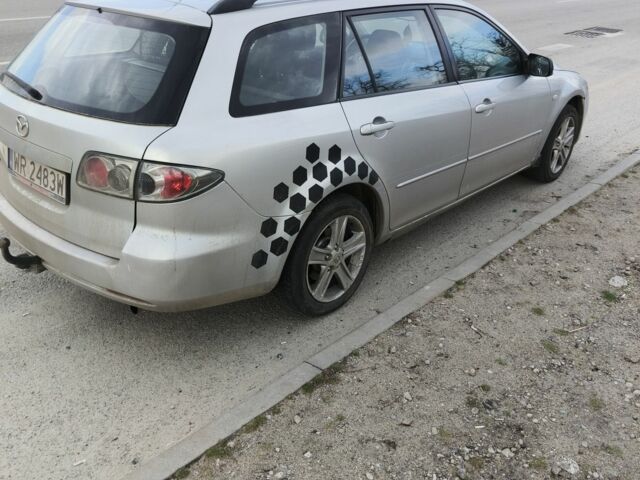 Серый Мазда 6, объемом двигателя 2 л и пробегом 278 тыс. км за 1750 $, фото 1 на Automoto.ua