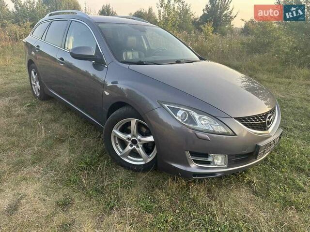 Серый Мазда 6, объемом двигателя 2 л и пробегом 245 тыс. км за 6800 $, фото 1 на Automoto.ua