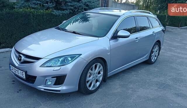 Серый Мазда 6, объемом двигателя 2.2 л и пробегом 235 тыс. км за 9000 $, фото 1 на Automoto.ua