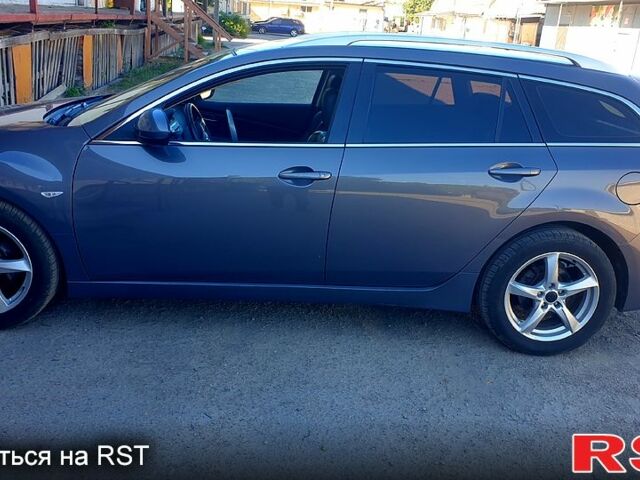 Серый Мазда 6, объемом двигателя 2 л и пробегом 245 тыс. км за 6500 $, фото 1 на Automoto.ua
