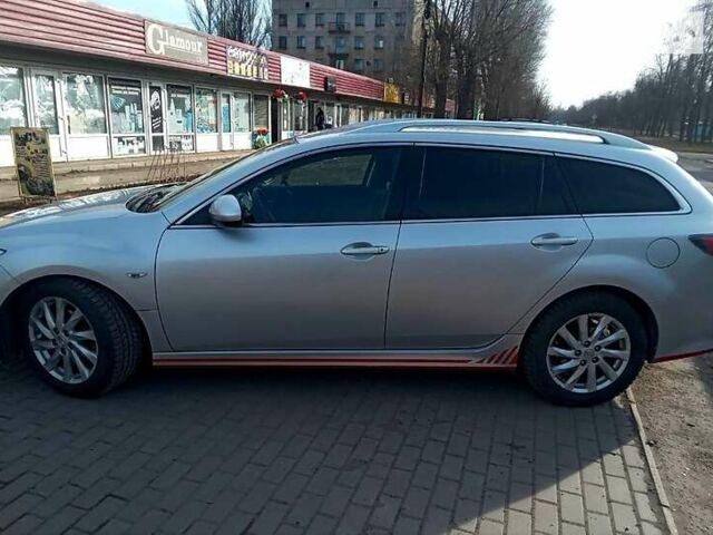 Серый Мазда 6, объемом двигателя 2.2 л и пробегом 300 тыс. км за 8000 $, фото 1 на Automoto.ua