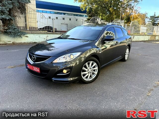Серый Мазда 6, объемом двигателя 2 л и пробегом 183 тыс. км за 8400 $, фото 1 на Automoto.ua