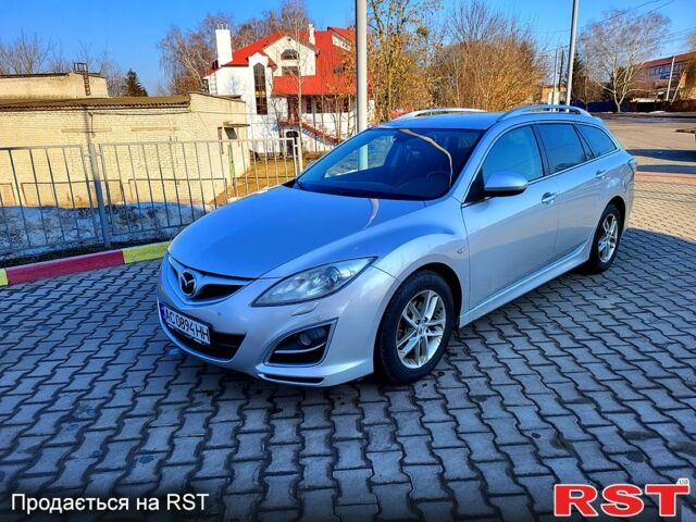 Серый Мазда 6, объемом двигателя 2.2 л и пробегом 291 тыс. км за 6600 $, фото 1 на Automoto.ua