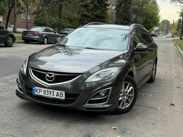 Серый Мазда 6, объемом двигателя 2 л и пробегом 226 тыс. км за 7400 $, фото 1 на Automoto.ua