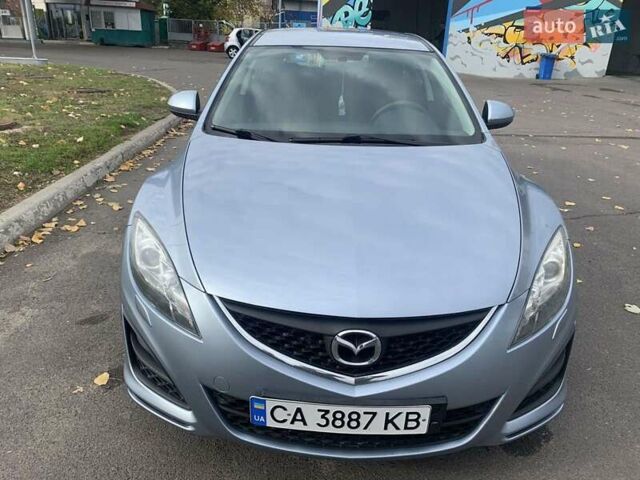 Серый Мазда 6, объемом двигателя 1.8 л и пробегом 207 тыс. км за 8900 $, фото 1 на Automoto.ua