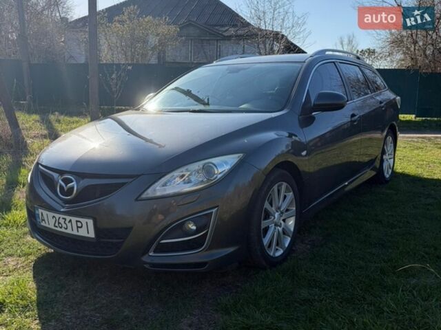 Серый Мазда 6, объемом двигателя 2.18 л и пробегом 248 тыс. км за 8600 $, фото 1 на Automoto.ua