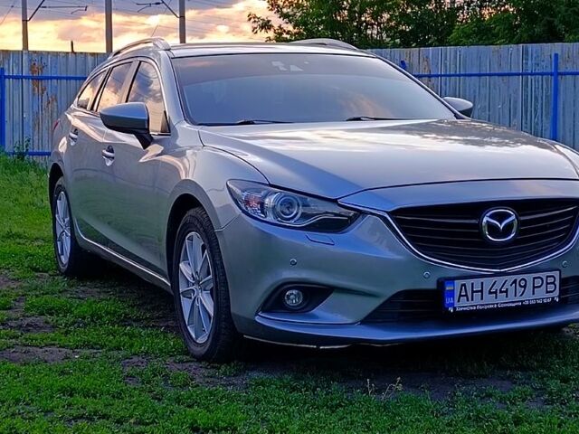 Серый Мазда 6, объемом двигателя 2.2 л и пробегом 222 тыс. км за 9900 $, фото 1 на Automoto.ua