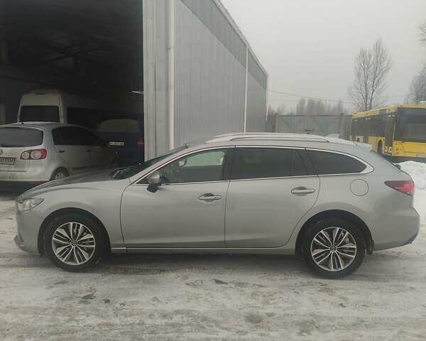 Серый Мазда 6, объемом двигателя 2.19 л и пробегом 243 тыс. км за 10700 $, фото 1 на Automoto.ua