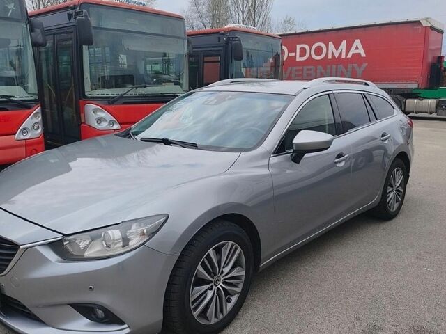 Серый Мазда 6, объемом двигателя 2.19 л и пробегом 243 тыс. км за 10300 $, фото 1 на Automoto.ua