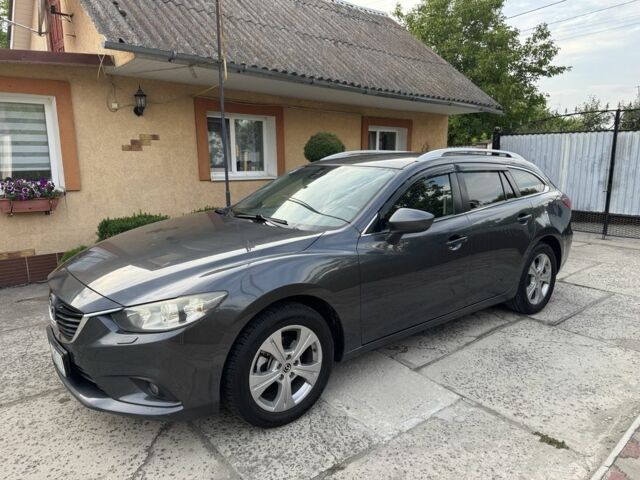 Серый Мазда 6, объемом двигателя 1.6 л и пробегом 247 тыс. км за 8850 $, фото 1 на Automoto.ua