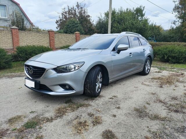 Серый Мазда 6, объемом двигателя 2.2 л и пробегом 195 тыс. км за 12500 $, фото 1 на Automoto.ua