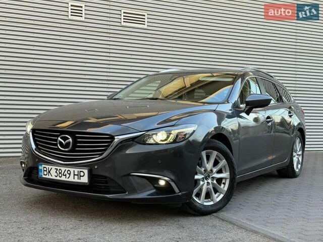 Серый Мазда 6, объемом двигателя 2.2 л и пробегом 248 тыс. км за 12850 $, фото 1 на Automoto.ua
