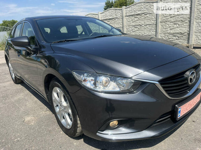 Серый Мазда 6, объемом двигателя 2.2 л и пробегом 180 тыс. км за 12800 $, фото 1 на Automoto.ua