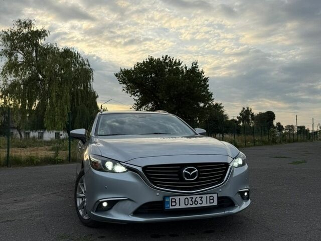 Сірий Мазда 6, об'ємом двигуна 2.2 л та пробігом 211 тис. км за 12000 $, фото 1 на Automoto.ua