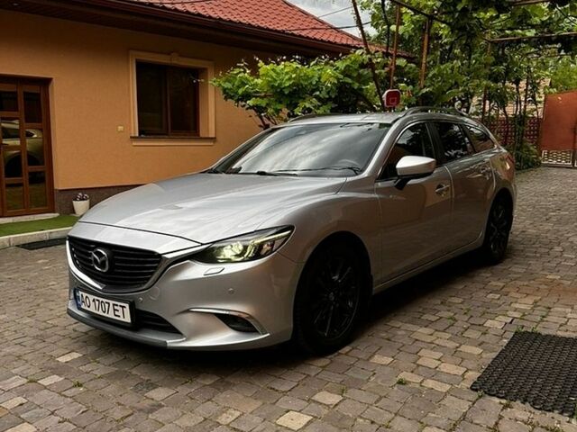 Серый Мазда 6, объемом двигателя 2 л и пробегом 195 тыс. км за 13950 $, фото 1 на Automoto.ua
