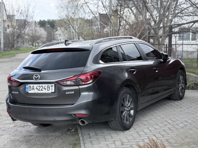Серый Мазда 6, объемом двигателя 2 л и пробегом 118 тыс. км за 18200 $, фото 1 на Automoto.ua