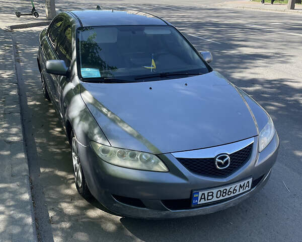 Серый Мазда 6, объемом двигателя 2 л и пробегом 389 тыс. км за 4000 $, фото 1 на Automoto.ua