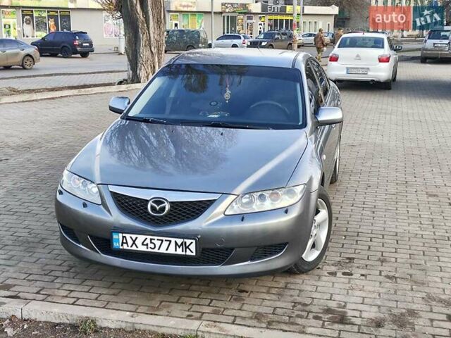 Серый Мазда 6, объемом двигателя 2 л и пробегом 312 тыс. км за 4300 $, фото 1 на Automoto.ua