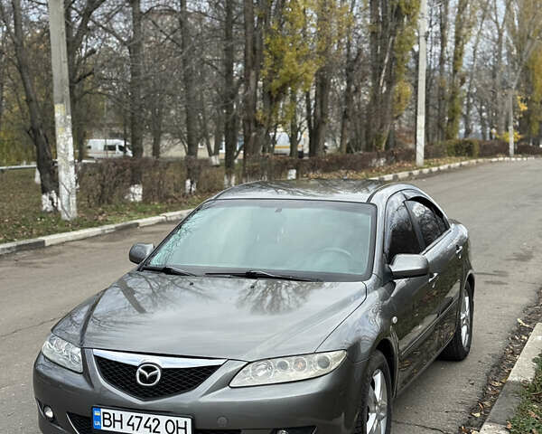 Серый Мазда 6, объемом двигателя 2 л и пробегом 243 тыс. км за 4200 $, фото 1 на Automoto.ua