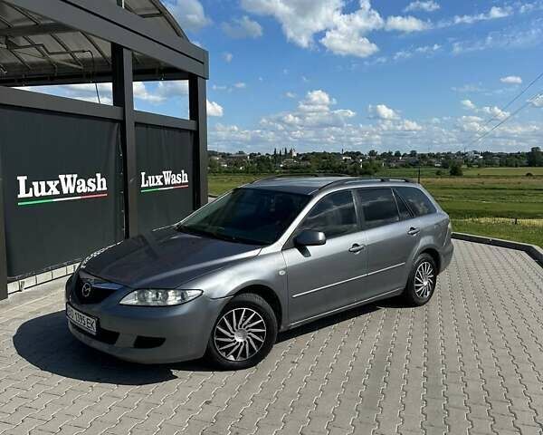 Серый Мазда 6, объемом двигателя 2 л и пробегом 280 тыс. км за 2550 $, фото 1 на Automoto.ua