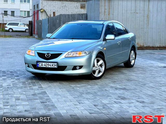 Серый Мазда 6, объемом двигателя 1.8 л и пробегом 246 тыс. км за 3500 $, фото 1 на Automoto.ua