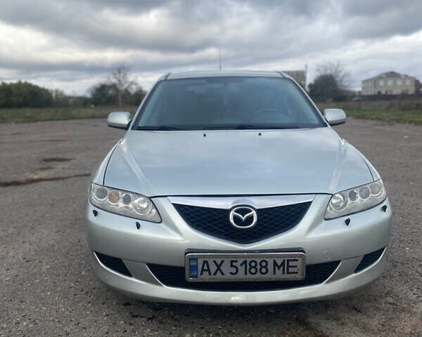 Серый Мазда 6, объемом двигателя 2 л и пробегом 251 тыс. км за 6100 $, фото 1 на Automoto.ua