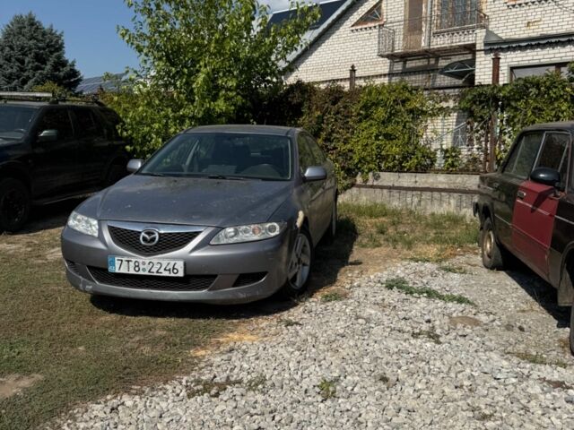 Серый Мазда 6, объемом двигателя 0 л и пробегом 278 тыс. км за 1400 $, фото 1 на Automoto.ua