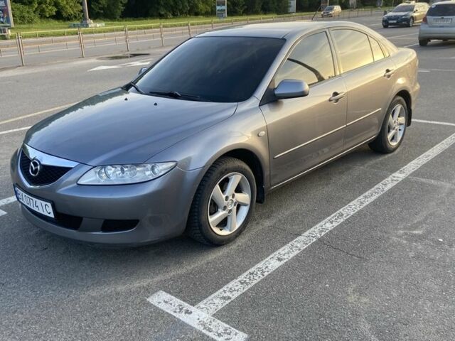 Серый Мазда 6, объемом двигателя 1.8 л и пробегом 219 тыс. км за 3999 $, фото 1 на Automoto.ua