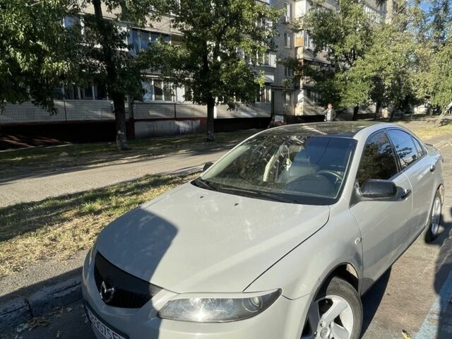 Серый Мазда 6, объемом двигателя 2 л и пробегом 245 тыс. км за 3700 $, фото 1 на Automoto.ua