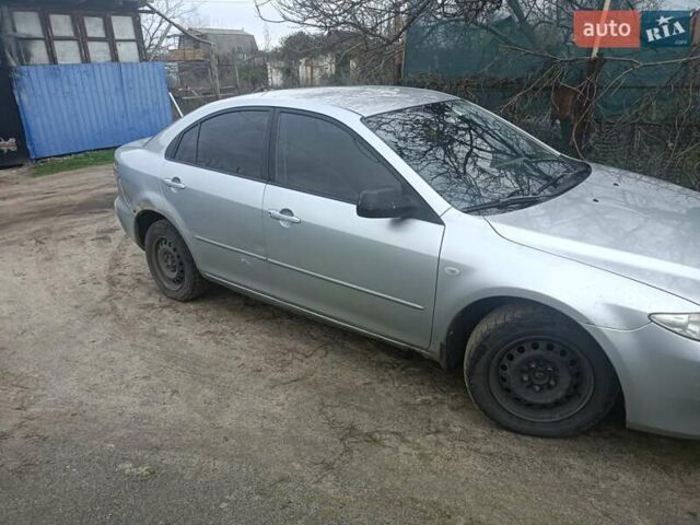 Серый Мазда 6, объемом двигателя 2 л и пробегом 310 тыс. км за 1800 $, фото 1 на Automoto.ua