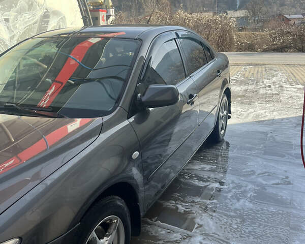 Сірий Мазда 6, об'ємом двигуна 2 л та пробігом 340 тис. км за 3999 $, фото 1 на Automoto.ua