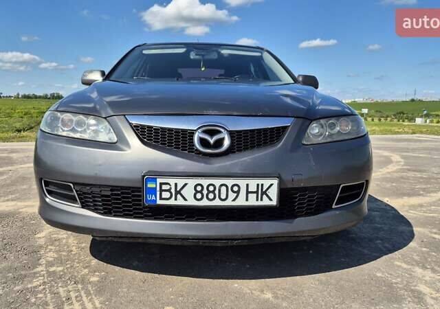 Сірий Мазда 6, об'ємом двигуна 2 л та пробігом 435 тис. км за 4300 $, фото 1 на Automoto.ua