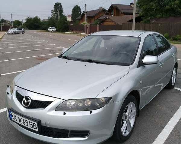 Серый Мазда 6, объемом двигателя 1.8 л и пробегом 231 тыс. км за 5600 $, фото 1 на Automoto.ua