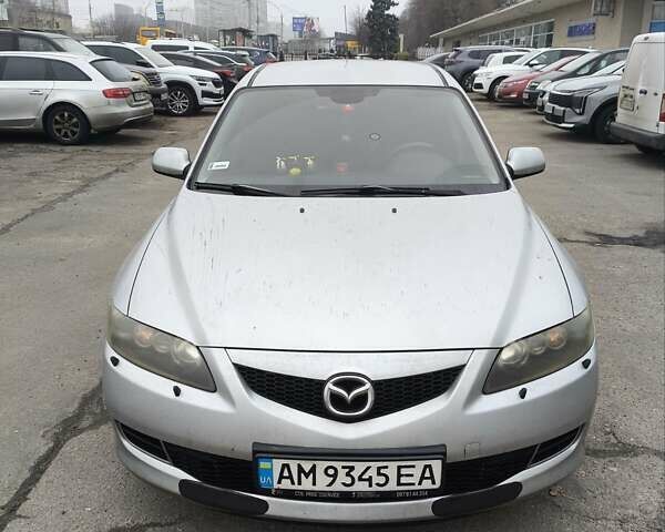 Серый Мазда 6, объемом двигателя 2 л и пробегом 233 тыс. км за 5500 $, фото 1 на Automoto.ua
