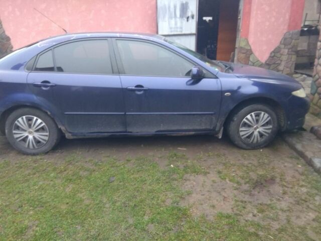 Синий Мазда 6, объемом двигателя 1.8 л и пробегом 360 тыс. км за 1100 $, фото 1 на Automoto.ua