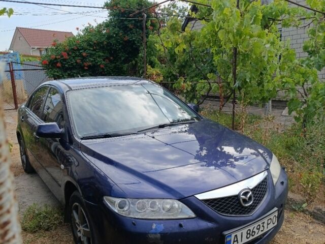 Синий Мазда 6, объемом двигателя 2 л и пробегом 450 тыс. км за 2700 $, фото 1 на Automoto.ua