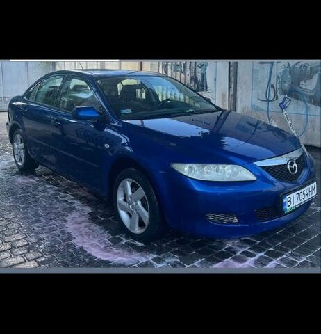 Синий Мазда 6, объемом двигателя 2 л и пробегом 290 тыс. км за 2608 $, фото 1 на Automoto.ua