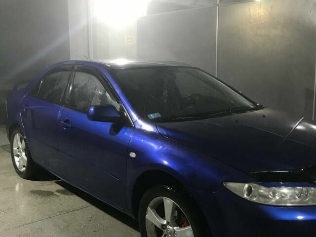Синий Мазда 6, объемом двигателя 2 л и пробегом 270 тыс. км за 1806 $, фото 1 на Automoto.ua