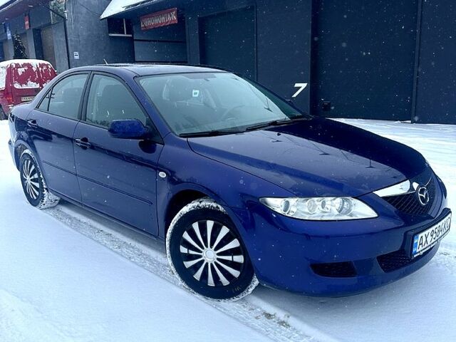 Синий Мазда 6, объемом двигателя 1.8 л и пробегом 169 тыс. км за 5000 $, фото 1 на Automoto.ua