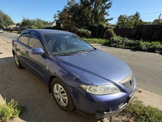 Синий Мазда 6, объемом двигателя 1.8 л и пробегом 499 тыс. км за 1600 $, фото 1 на Automoto.ua