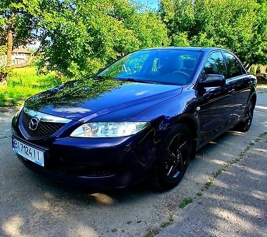 Синій Мазда 6, об'ємом двигуна 2 л та пробігом 317 тис. км за 3400 $, фото 1 на Automoto.ua