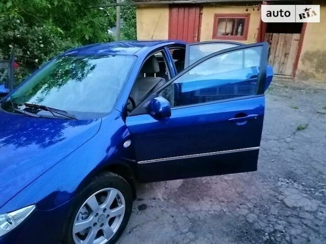 Синій Мазда 6, об'ємом двигуна 2 л та пробігом 255 тис. км за 5500 $, фото 1 на Automoto.ua