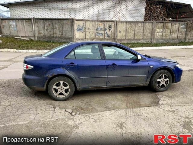 Синий Мазда 6, объемом двигателя 18 л и пробегом 200 тыс. км за 1800 $, фото 1 на Automoto.ua