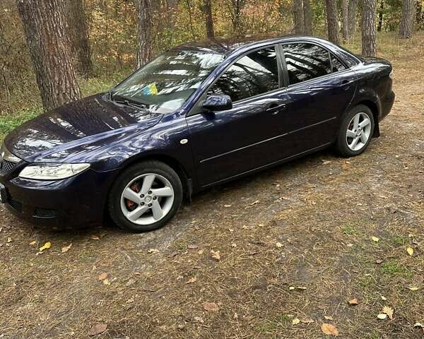 Синий Мазда 6, объемом двигателя 2 л и пробегом 286 тыс. км за 3800 $, фото 1 на Automoto.ua
