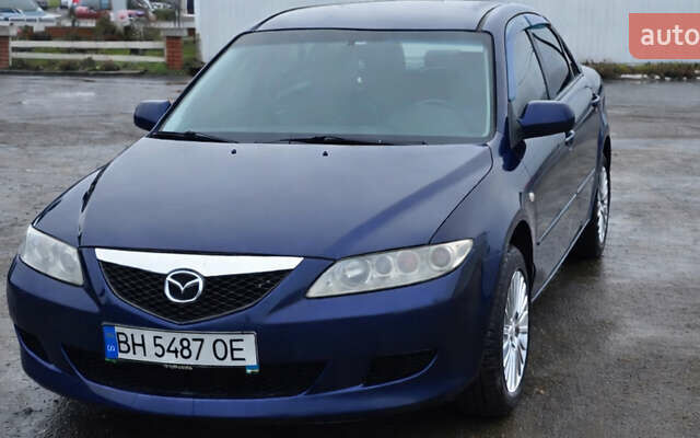 Синий Мазда 6, объемом двигателя 1.8 л и пробегом 189 тыс. км за 3000 $, фото 1 на Automoto.ua